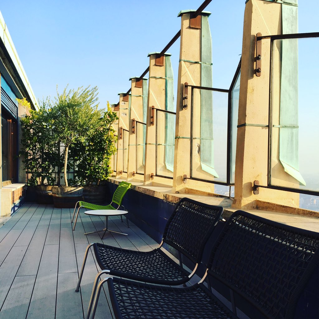 DomusWeb's tweet photo. #livingdivani presents its collection on the rooftop of #BBPR's #torrevelasca, one of #Milan brutalist icons https://t.co/WyuLWHF6Ud
