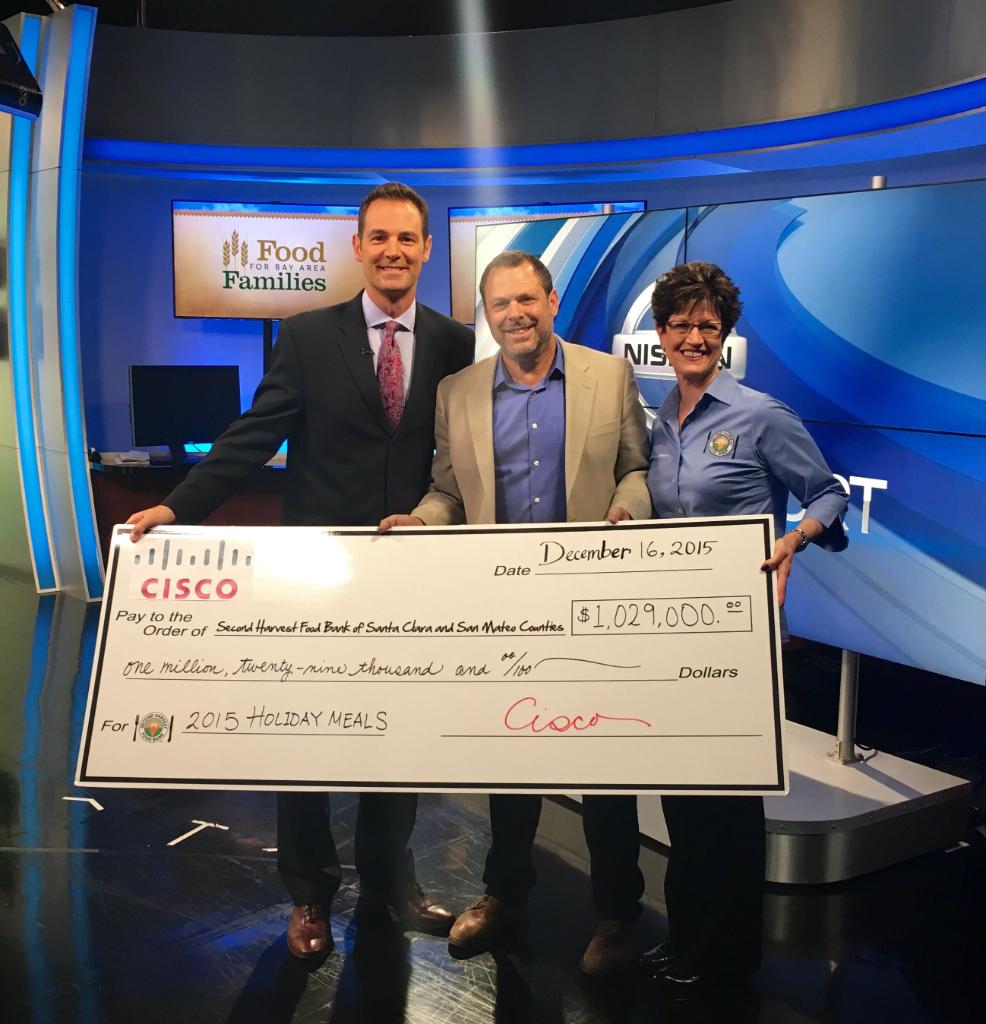 Cisco's tweet photo. Cisco donates over $1M to @2ndharvest to give 2M meals to familes in need. https://t.co/Xc3QG33G2x  #WeAreCisco https://t.co/Xjqe7QN2cg