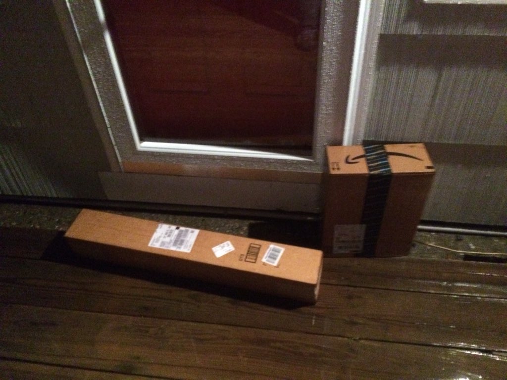 c_conway's tweet photo. Thanks @ups for leaving my boxes out in the pouring rain. Use common sense. https://t.co/vZLdFyZPUk