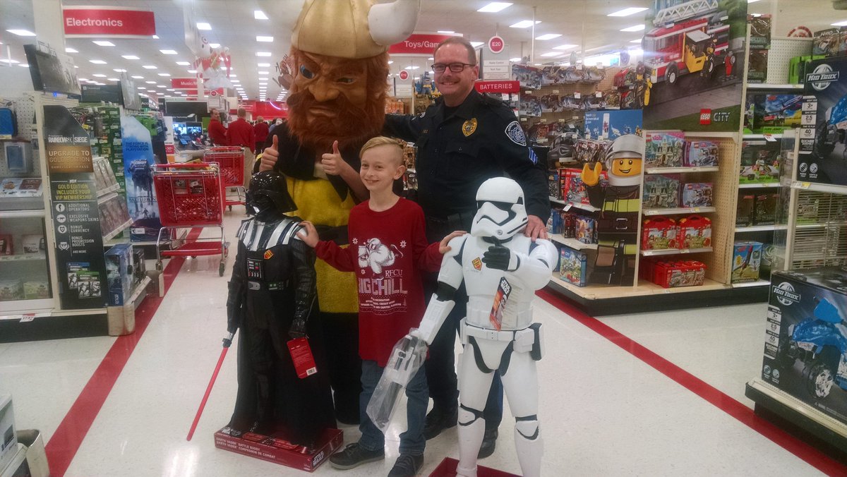 #StarWarsTheForceAwakens  at Heroes and Helpers event. Police and students partnering for holiday joy