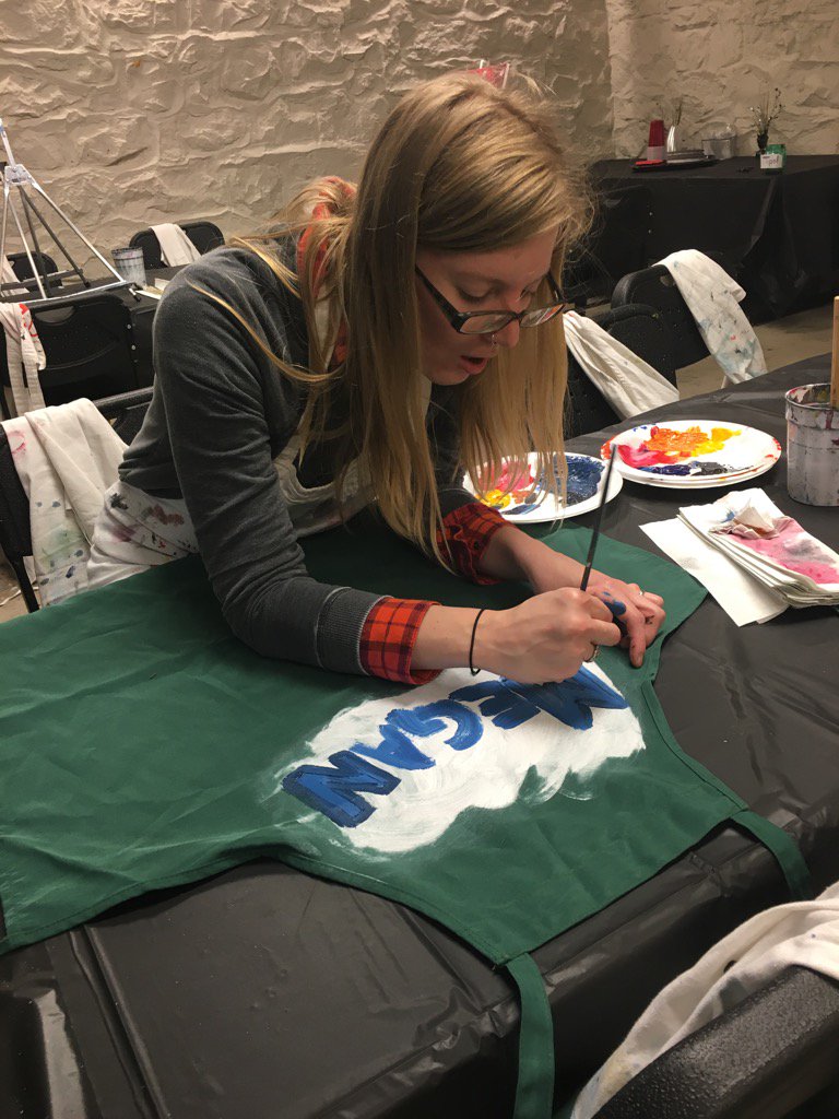PaintandPourA2's tweet photo. One of our artists, Megan painting a new apron before her class tonight. #painting #paintandpoura2 #art #artist https://t.co/A5jYLcFAt6