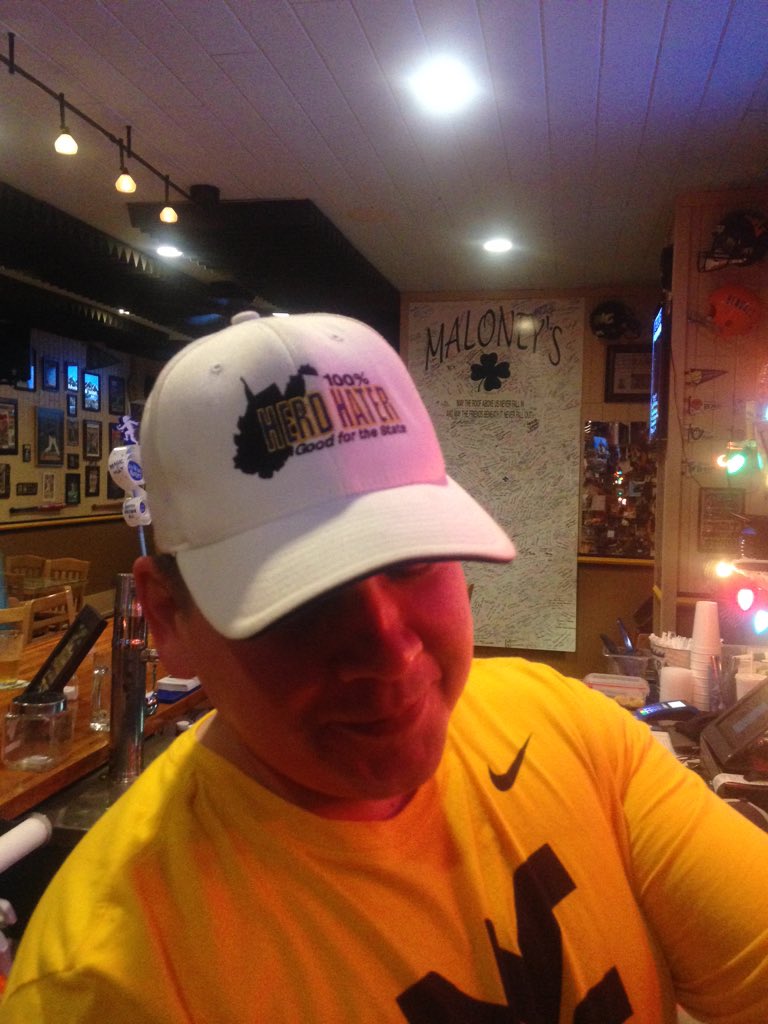 MaloneysPubWV's tweet photo. @herdHater Our bartender for the game tonight! #checkoutthehat https://t.co/LFahwaB1dA