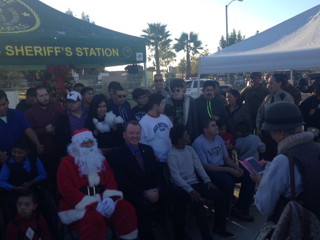 sbLASD's tweet photo. Sheriff McDonnell and Santa provide gifts for kids from AbilityFirst. @LASDHQ https://t.co/EHGV3gIzjn