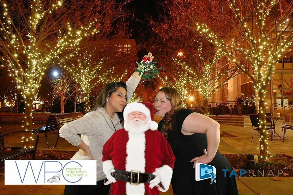 Smooching with pint sized Santa! <a href="/WeddingProsCols/">Wedding Pros of Cols</a> holiday party 2015! #cbus #Santa #threesome