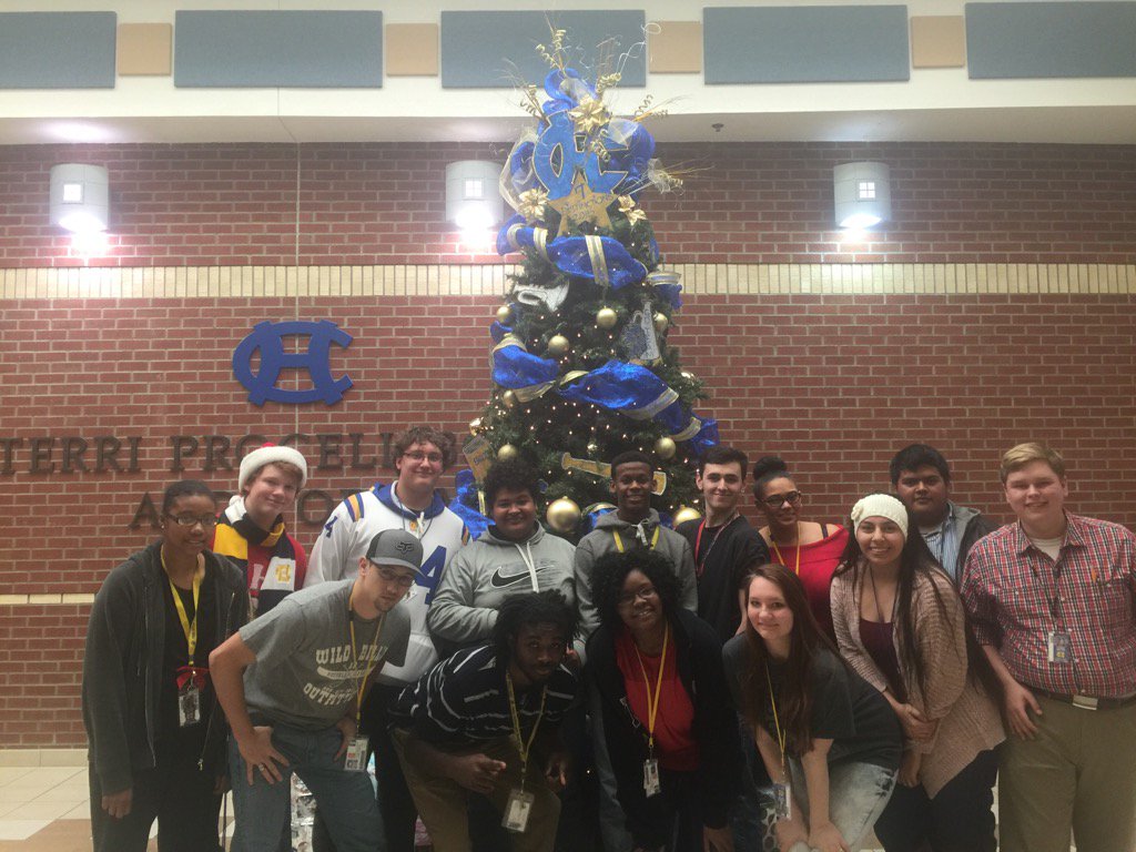 Students at Chapel Hill HS take time to pose in front of the school tree. They are ready for the Christmas break!