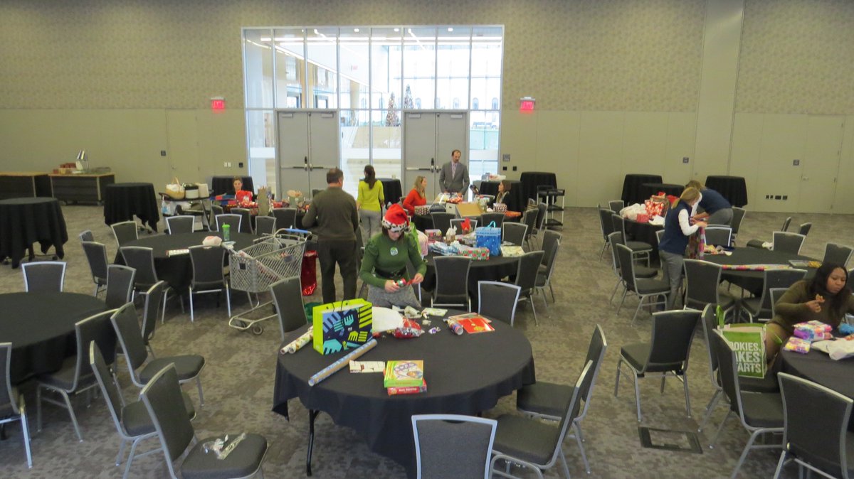 CLEconventions's tweet photo. The team helped wrap some gifts for families in need! #adoptafamily #tistheseason https://t.co/VNK1uUMxHT