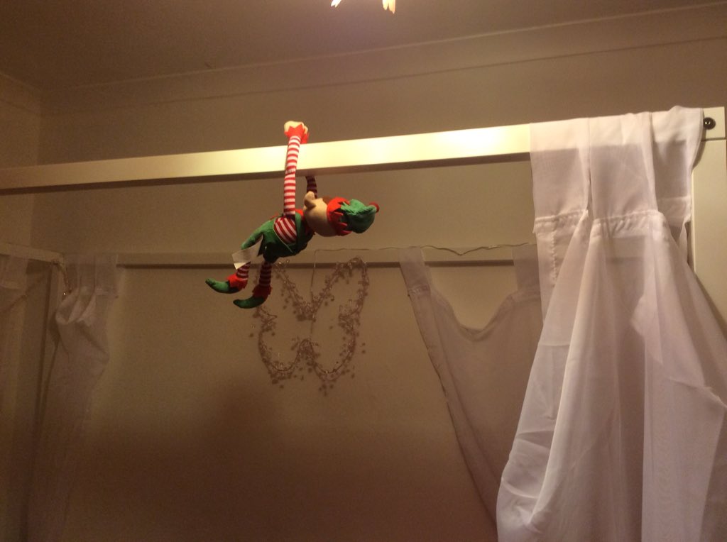 Day 18, Mr Elfie hanging on Ayushi's bed #elfonashelf
