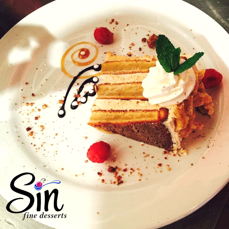 SinDesserts's tweet photo. Our Peanut Butter Banana Cake combines vanilla, PB, brown butter cream &amp; salted pecan brittle for a #tasty treat! https://t.co/SWJLDW4RW9
