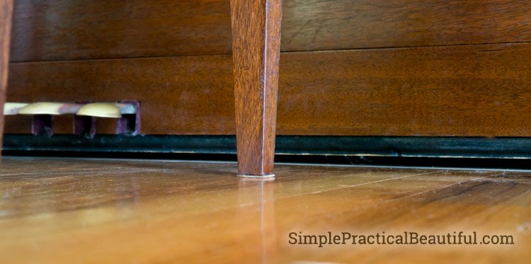 DIY leather furniture pads to protect my wood floor #ontheblog #woodfloor #furnitureupgrade simplepracticalbeautiful.com/?p=1074