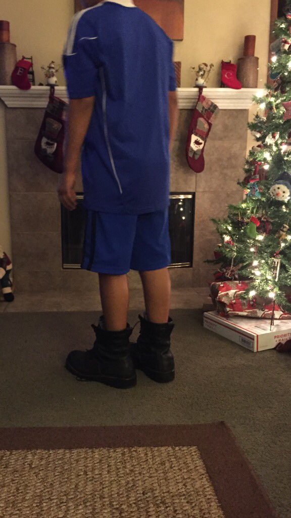 PJ2515's tweet photo. This lil kid might be getting taller, but he's still not big enough to rock MY work boots! #NotYet #SilverbackStatus https://t.co/Qm84gqhBbN
