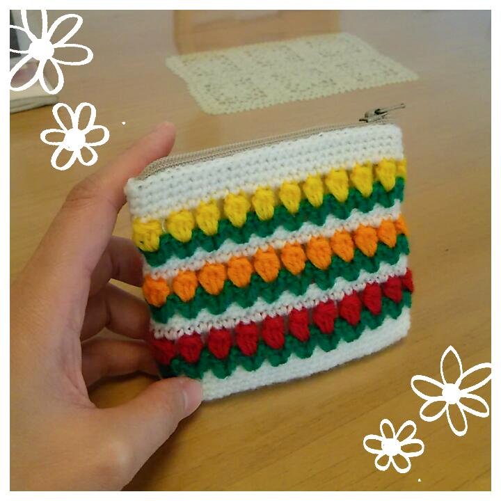 のの字 チューリップ畑のミニミニポーチにしたよ 内布つけた まつり縫いガタガタ かぎ針編み T Co Vuaahigwnn