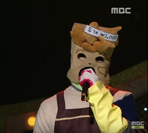 soompi's tweet photo. WATCH: Which Idol Star Was Behind “Fish-Shaped Bun” On #KingofMaskSinger ? https://t.co/oAdRnTGujJ https://t.co/1cppuQzUho