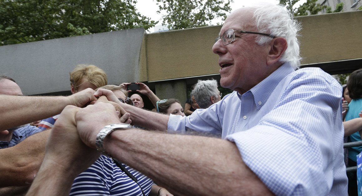 politico's tweet photo. Bernie Sanders passes Obama fundraising mark https://t.co/CuA17ElsU1 | AP Photo https://t.co/45XzVmvtCk