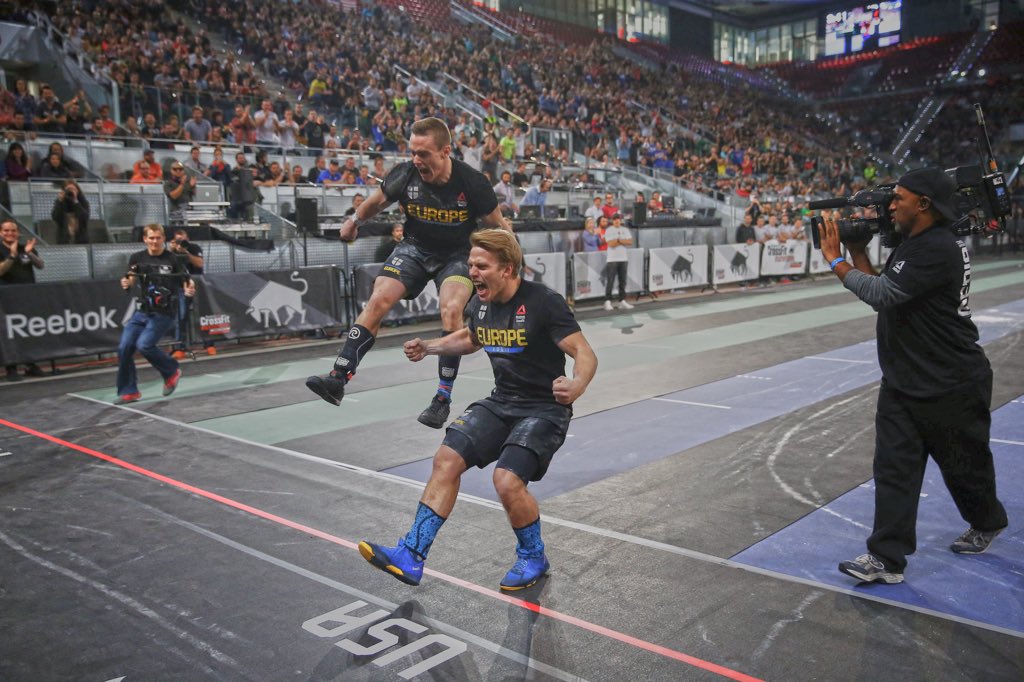CrossFitGames's tweet photo. Jonne Koski and @bjorgvinkarl of Europe after winning their heat of Event 3 at the CrossFit Invitational. https://t.co/VjKDQbBPzc