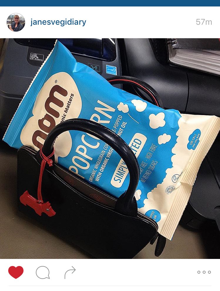 nom_foods's tweet photo. What's #organic, #vegan, delicious and fits in a handbag? #nompopcorn https://t.co/BI9a3eKKon