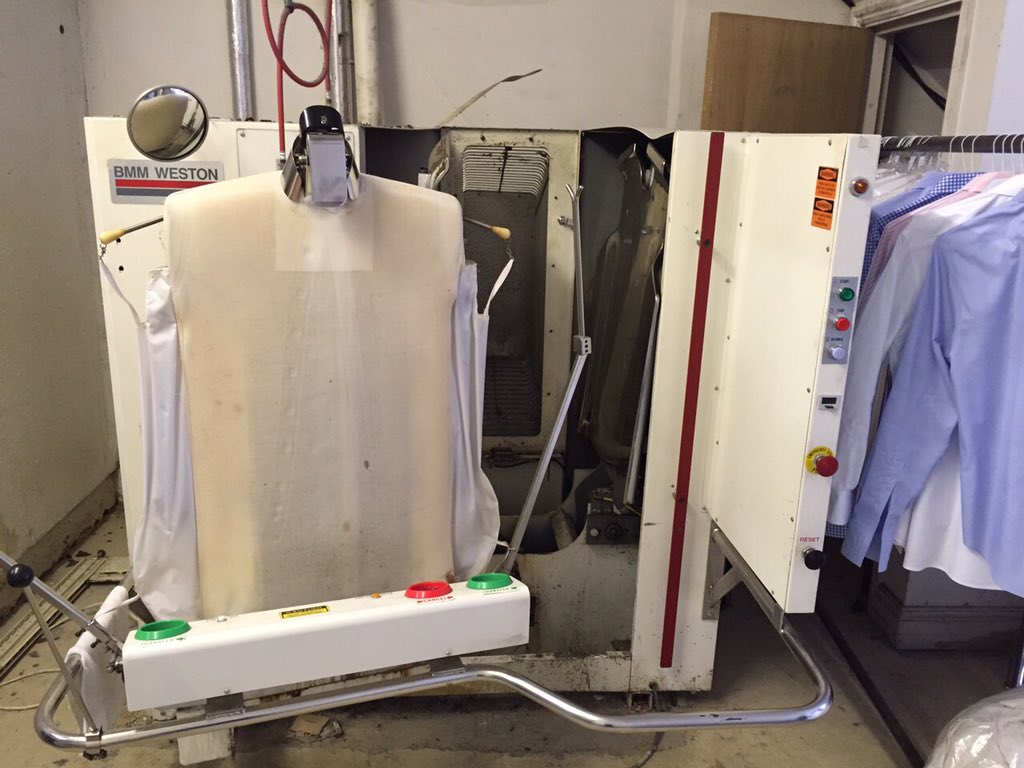 We press shirts on shirt machine