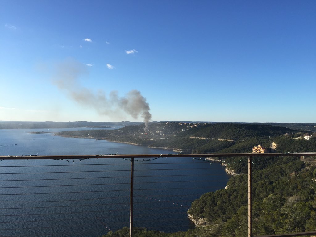 mrnikonair's tweet photo. House on fire in Lake Travis area. Taken from Oasis Brewery @KXAN_News https://t.co/KqJfvLB7J7