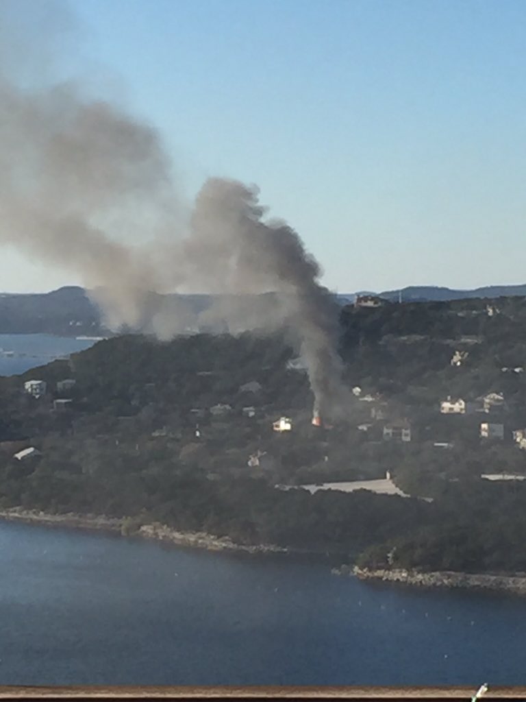 mrnikonair's tweet photo. House on fire in Lake Travis area. Taken from Oasis Brewery @KXAN_News https://t.co/KqJfvLB7J7