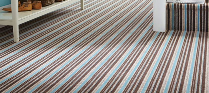 A splash of #stripes in a #carpet not only does it brighten up the room, but it also uplifts the mood in a home.