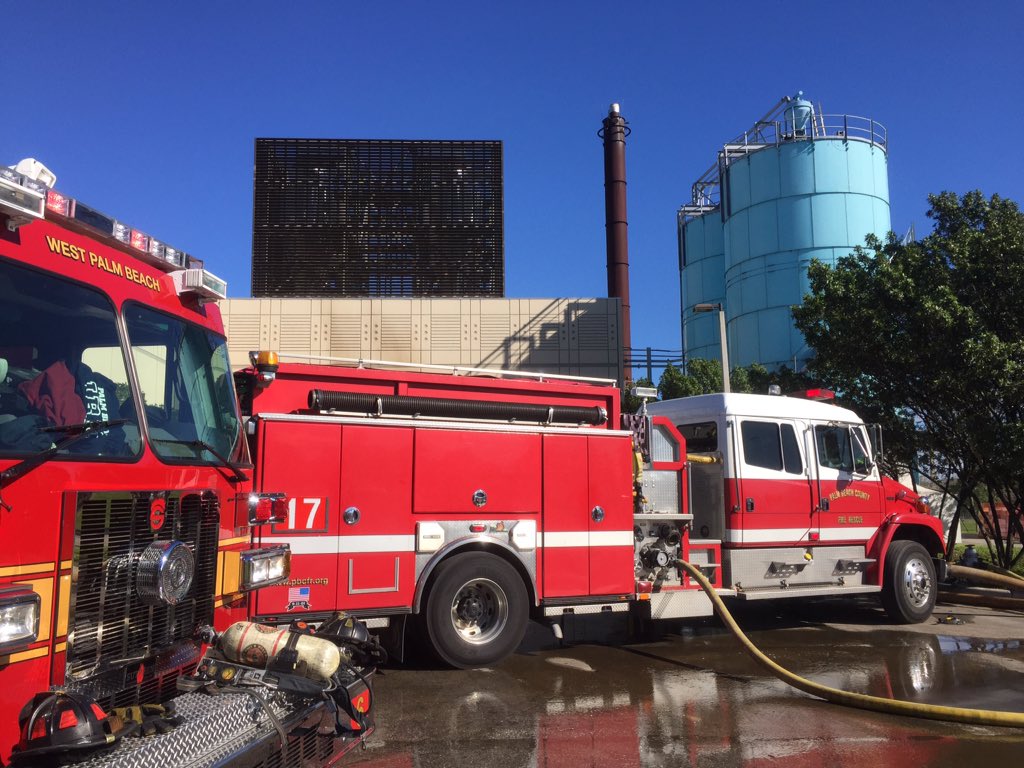 PBCFR's tweet photo. SWA Cmd *update* crews from @PBCFR @PBGardensFire and #WPBFR working the fire at the SWA Processing Center https://t.co/RmMrFfq3qF