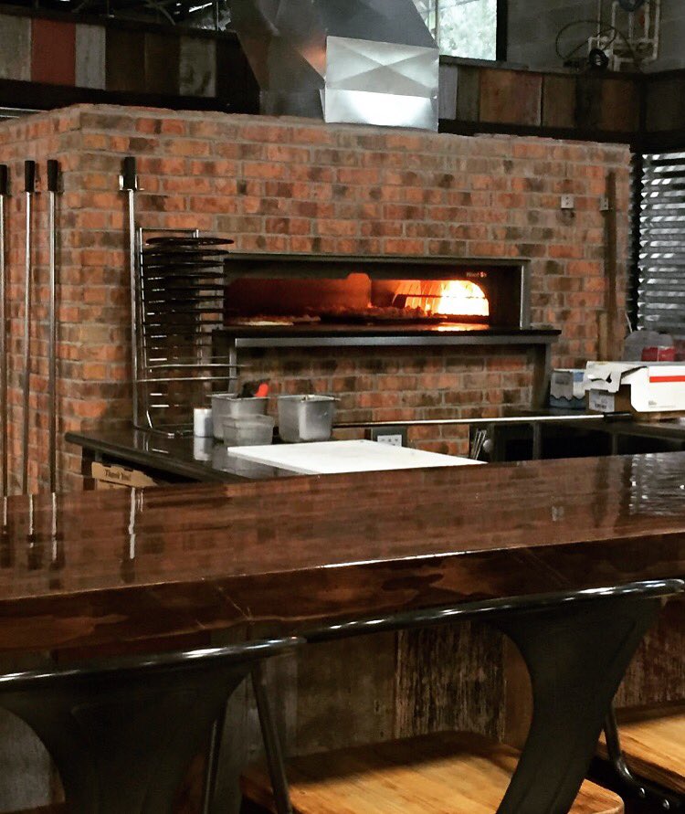 PlantStreet's tweet photo. The Oven is Fired Up &amp; Ready to Make One of @MichaelsAli_ delicious Coal Fired Pizzas! 
#PlantStreetMarket https://t.co/I9tv2Zmsef