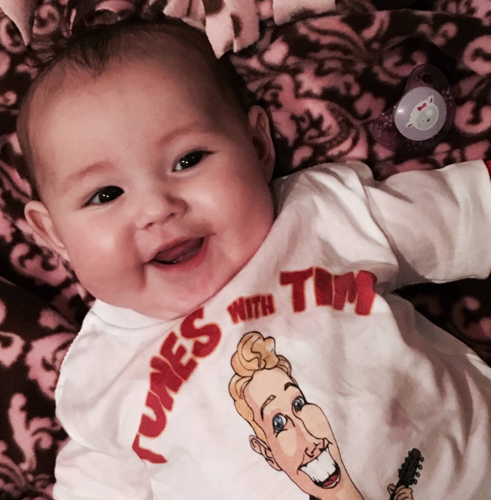 TunesWithTim's tweet photo. My niece Vivi...sporting her new #tuneswithtim swag...and loving it 😀. Happy New Year everyone! https://t.co/nN5NTttB0g