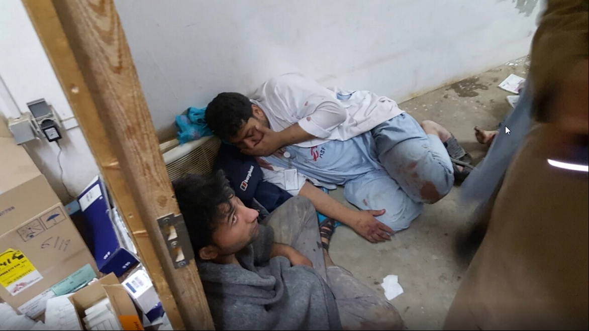 MSF's tweet photo. #MSF2015 #October: MSF staff in Kunduz hospital during the sustained aerial attack by the US Army #Afghanistan https://t.co/btN6KZ6WTj