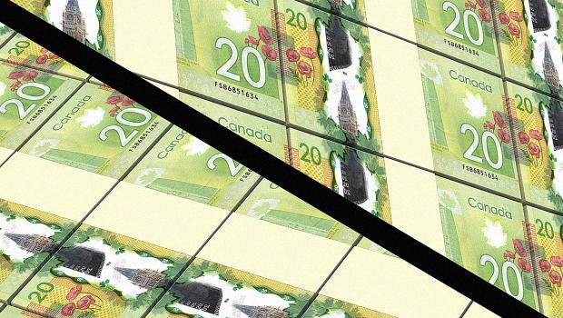 FastCompany's tweet photo. Canadians are cutting $20 bills in half to create a new, locals-only currency https://t.co/m7szG4NFQZ https://t.co/MDCggA6v8t
