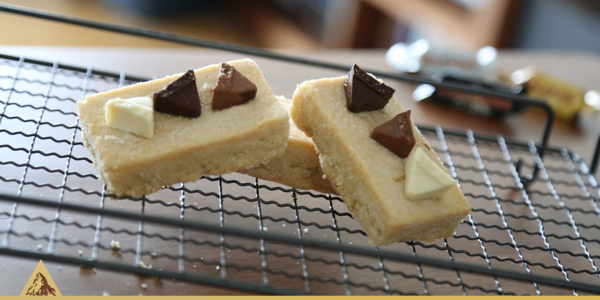 Toblerone's tweet photo. Chocolate, buttery biscuit goodness for a #BurnsNight treat! https://t.co/dmIGOUn3hV