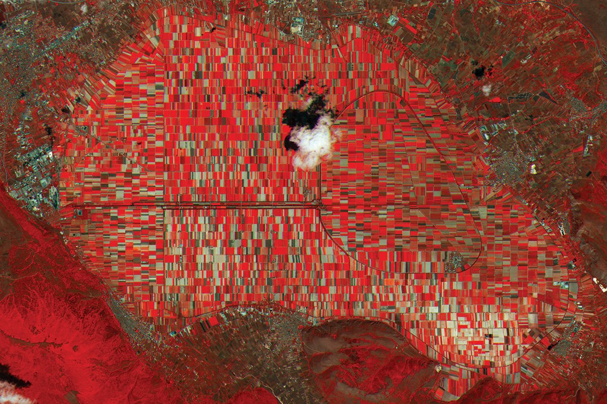 newscientist's tweet photo. It may look like a detail from a Klimt painting, but it's Italy's Fucino valley - from space https://t.co/dFSd68j948 https://t.co/nW8mbgd5Gv