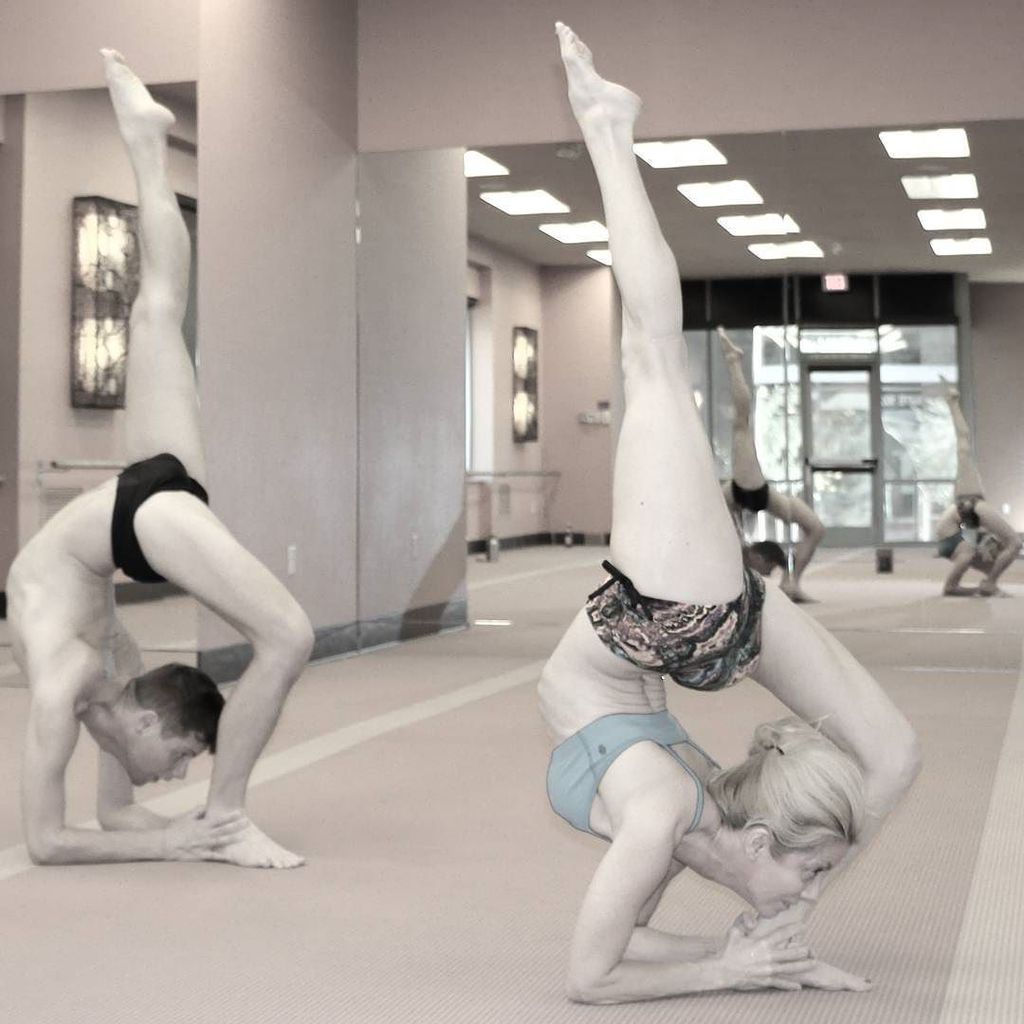 evolationyoga's tweet photo. #yoga #love @samuel_tanur @kimtangbyuv making it look easy! Two #oneleggedwheelpose #onele… https://t.co/CUFhvh42y9 https://t.co/8ZoAb1QMZh