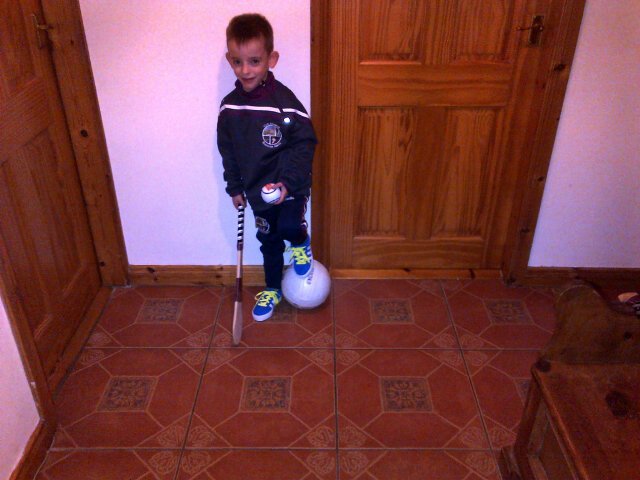 Dual player! 5 year old Fionn Wallace proudly wearing his new @GACSlaughtneil gear! #GAAChristmas @officialgaa