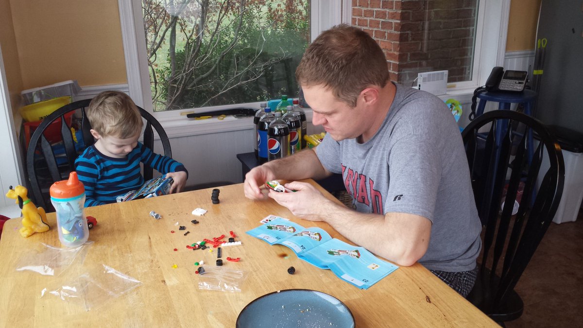 SCvach's tweet photo. How many boys does it take to put together a Lego set? #MerryChristmas  #ageappropriate #focused https://t.co/m3HdZhZCnG