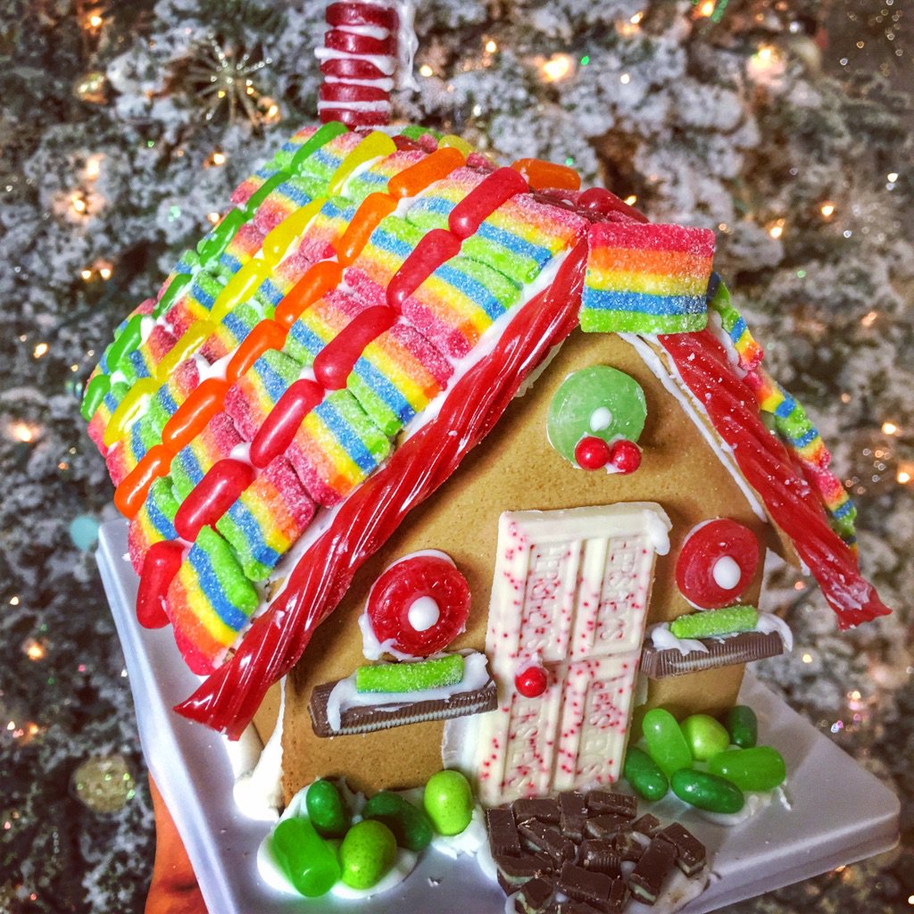 JoeyGraceffa's tweet photo. Yay! Finished my gingerbread house!! What do u guys think?! ❤️💛💚💙💜 https://t.co/NTaLGYFLP4