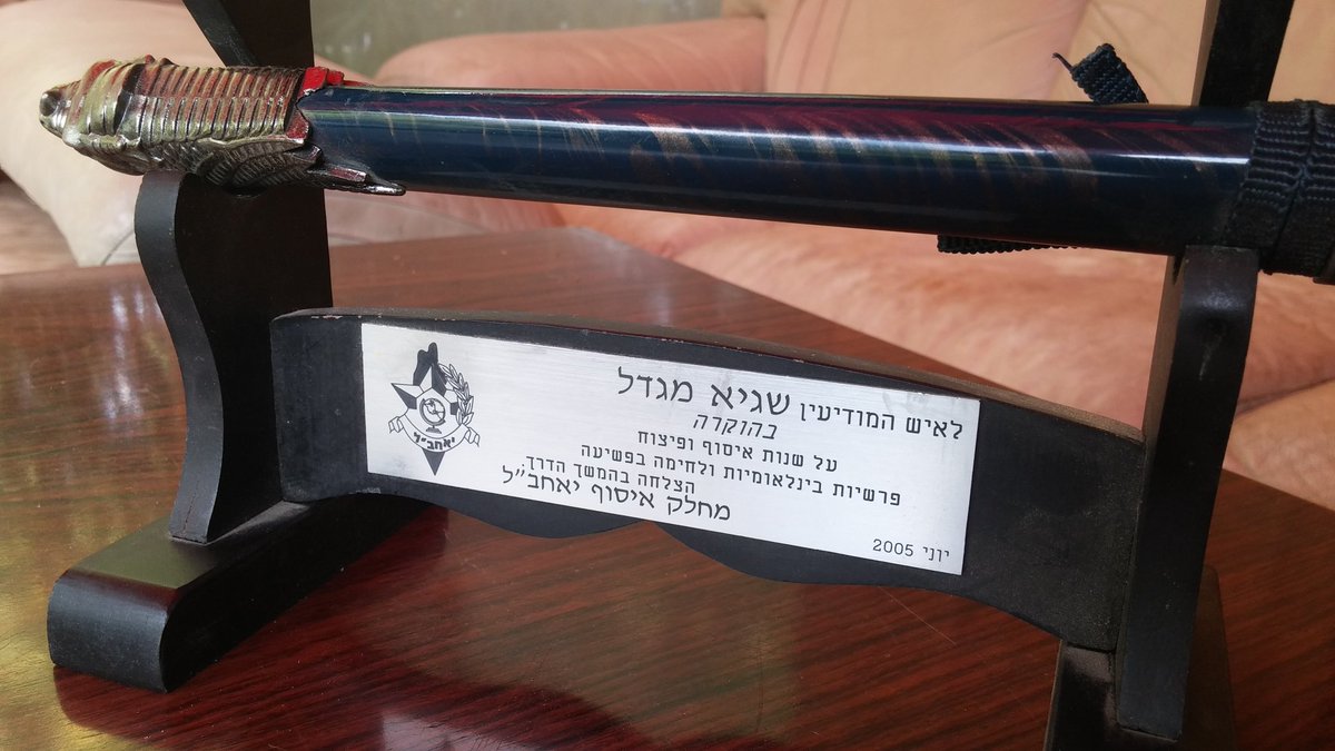 migdalser's tweet image. My comrades-in-arms presented me with samurai sword as a retirement gift - will have to ponder the meaning of that