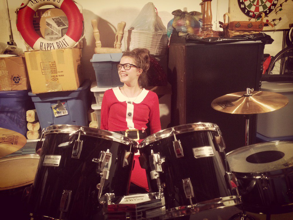  she got drums. Now what? She says \"happy birthday\" 