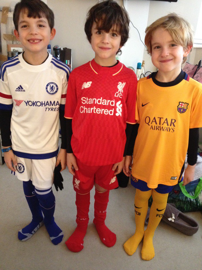 Going to football in their new kits.