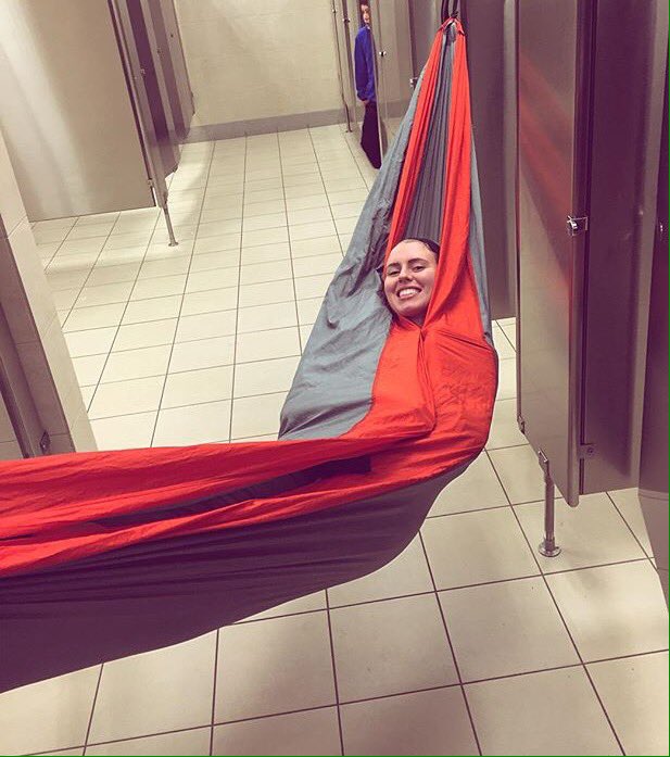 TheHenList's tweet photo. @ENOHammocks Always carry your ENO! Cancelled flights in Dallas left my girls hanging at the airport! Literally. https://t.co/NmQYB4j2sT