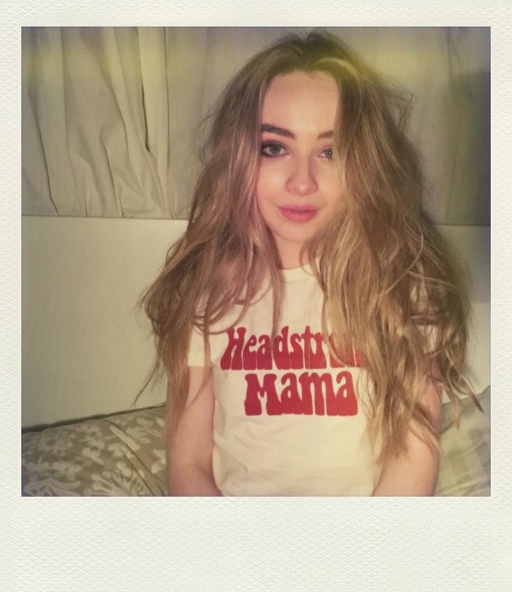 Sighs and sits on the tl crying. Her face and hair looking like this: