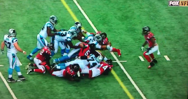 theScore's tweet photo. VIDEO: Cam Newton somehow powers through Falcons defense, picks up impressive 1st down. 😱 https://t.co/ib1AaEpKhz https://t.co/hupfMlwvj6