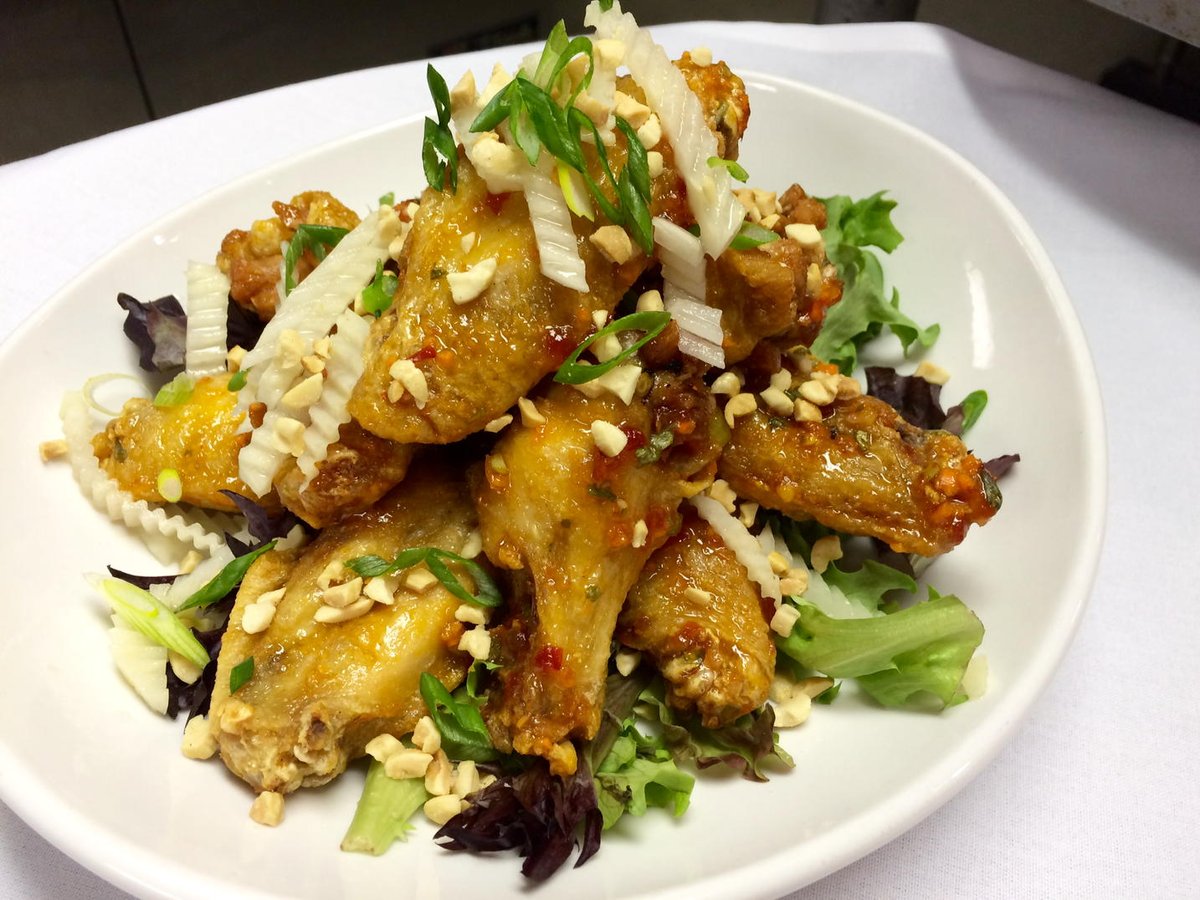 Blue_H2OGrill's tweet photo. Crispy fried wings tossed with sweet chili sauce and served with pickled Daikon radish and chopped peanuts https://t.co/rY940LxrH2