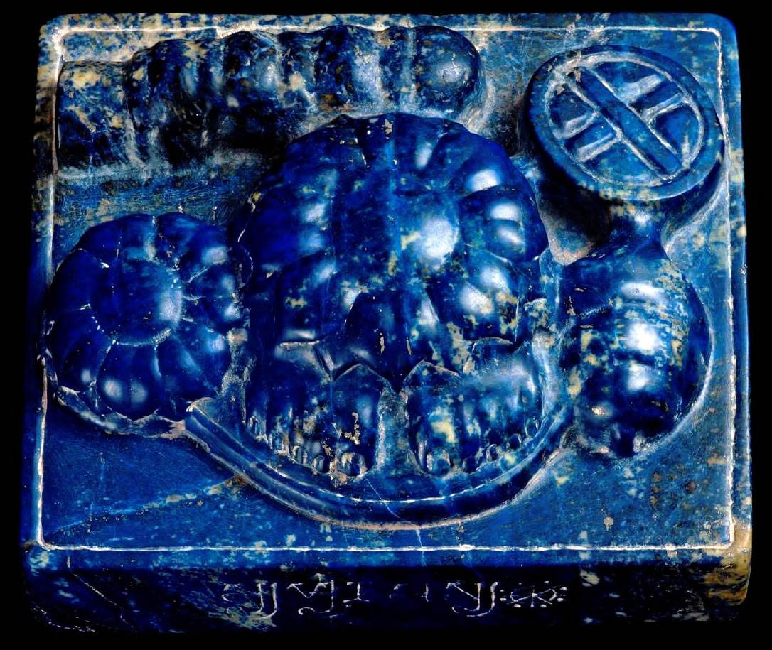 lapis lazuli viShNu feet with sha~Nkha, chakra, gadA and padma from gandhAra; gupta age