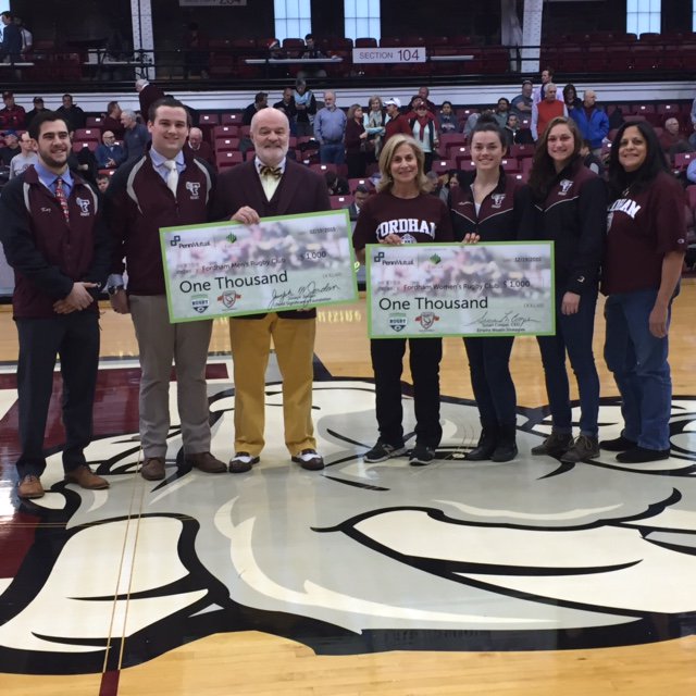 JosephWJordan's tweet photo. @pennmutual continues to support #rugby! Local NY agency presents checks to men's &amp; women's Fordham team. https://t.co/6zmV3RIiTS