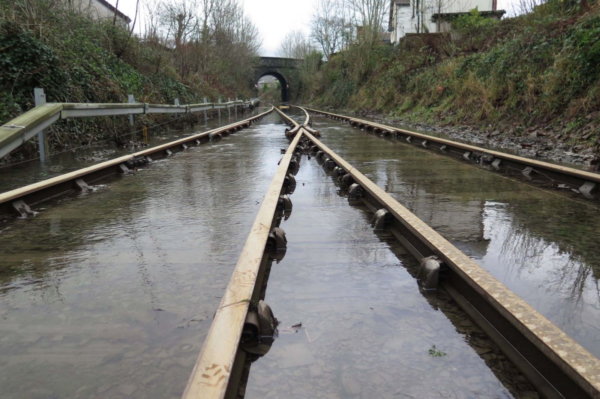 northwaleslive's tweet photo. Look at damage to Conwy Valley railway line caused by Boxing Day floods https://t.co/6D4t6lF35f https://t.co/N0vxLlkEB3