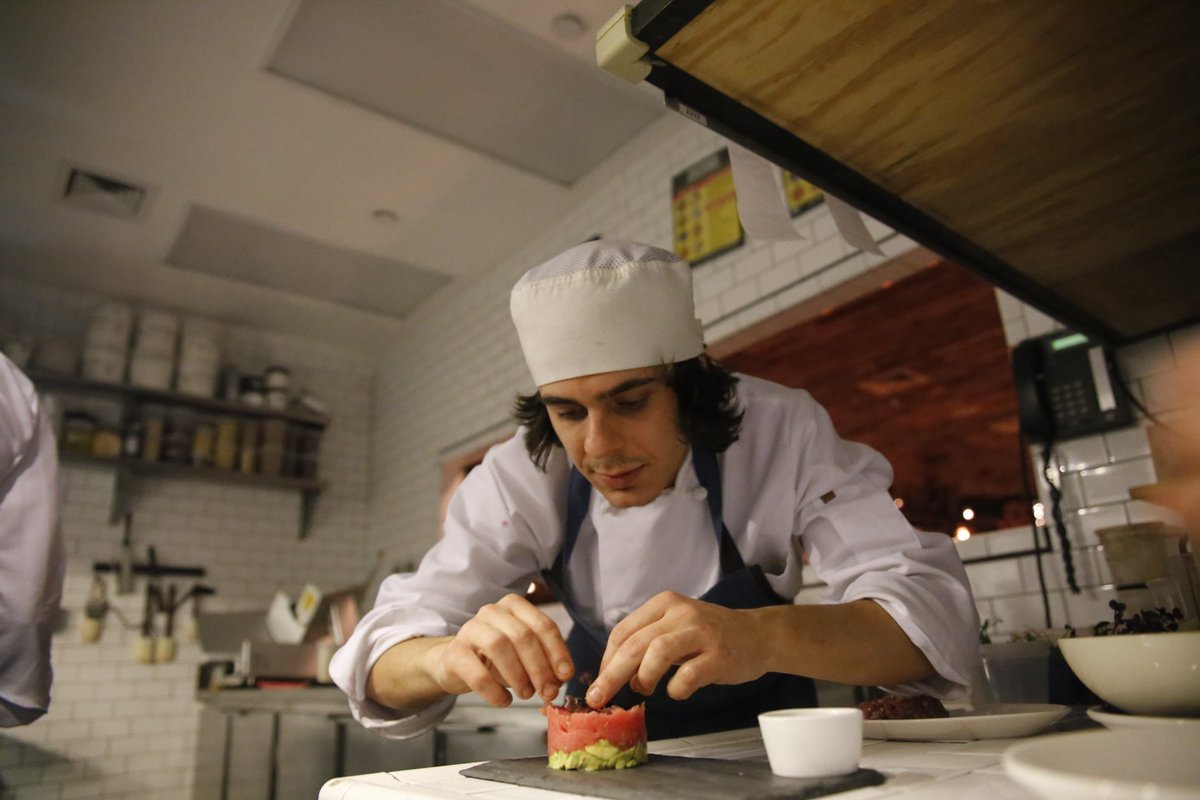 MIUSAWineBar's tweet photo. getting busy in the #kitchen @cheflife #cooking #tunatartare https://t.co/p3JTW5aeoj