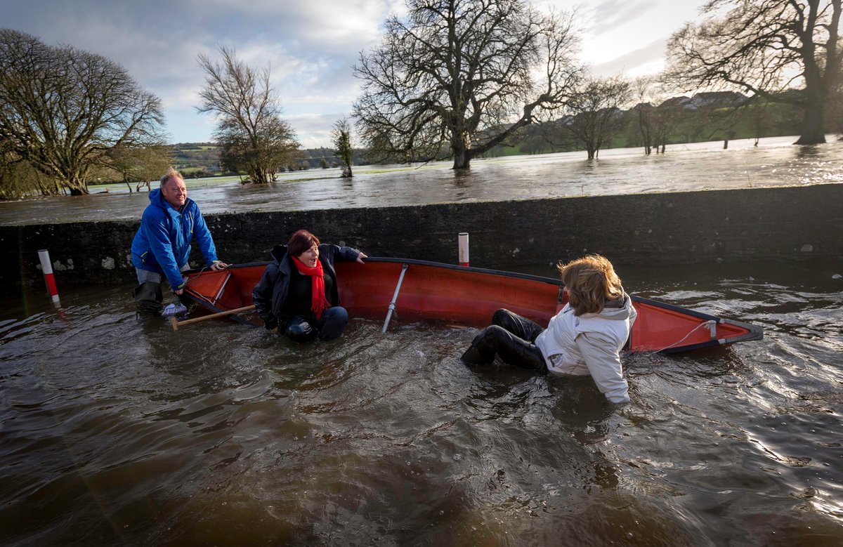 Pics: We hope Joan Burton had a change of clothes after a fall from a boat in floods today bit.ly/1P2y0SN
