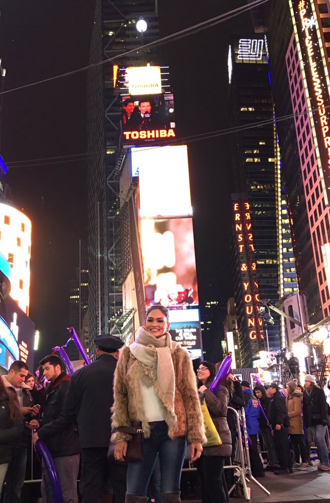 My first time to spend New Years in New York. I just watched the ball drop! This is beyond exciting! - Pia