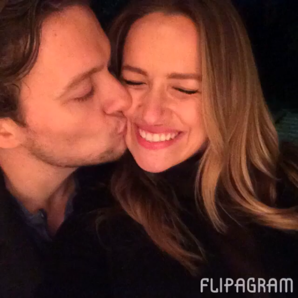 Boyfriend John Fletcher kissing his girlfriend Shantel VanSanten