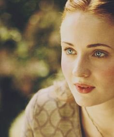 Her eyes are blue. 
Like wide open skies. 
She's ice. 
She's fire. 
A dream I dream. 
While awake.