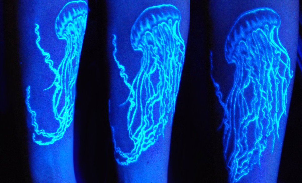 DeviantArt's tweet photo. A black light tattoo gives this artistic underwater creature a glow perfect for a jellyfish. https://t.co/RB5QYW8jAO https://t.co/GOaOXmIpYJ